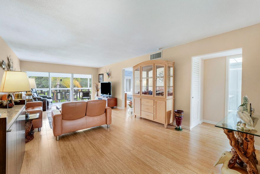 Very  clean condo in the Village of Tequesta.   Convenient to all Tequesta has to offer, shopping, restaurants and beaches.  Nicely furnished living area and prime bedroom.  Second bedroom could be furnished as a bedroom or used as an office or hobby space. Wood flooring throughout living area and bedrooms, plenty of closets.  The HVAC was replaced in 2025. Nice screened patio with rolldown shutters overlooking the common area. Ready for a new owner.  Unit can also be sold unfurnished.  Don't miss out on  this one.