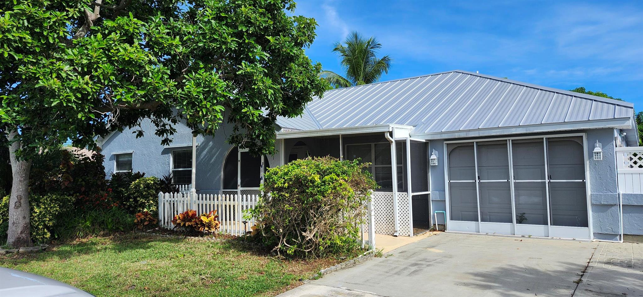 Newly renovated 4-bed, 2-bath pool home with canal frontage and a fully fenced backyard -- a perfect blend of casual waterfront living and low-maintenance convenience.Inside, the freshly renovated interior offers bright, comfortable living spaces and two updated baths. The flexible 4th bedroom (no closet) has its own exterior slider and is ideal as a den, mancave, playroom or home office. Outside, enjoy a private pool and peaceful canal views, plus the extra storage of two outdoor sheds. Washer and dryer are also included.