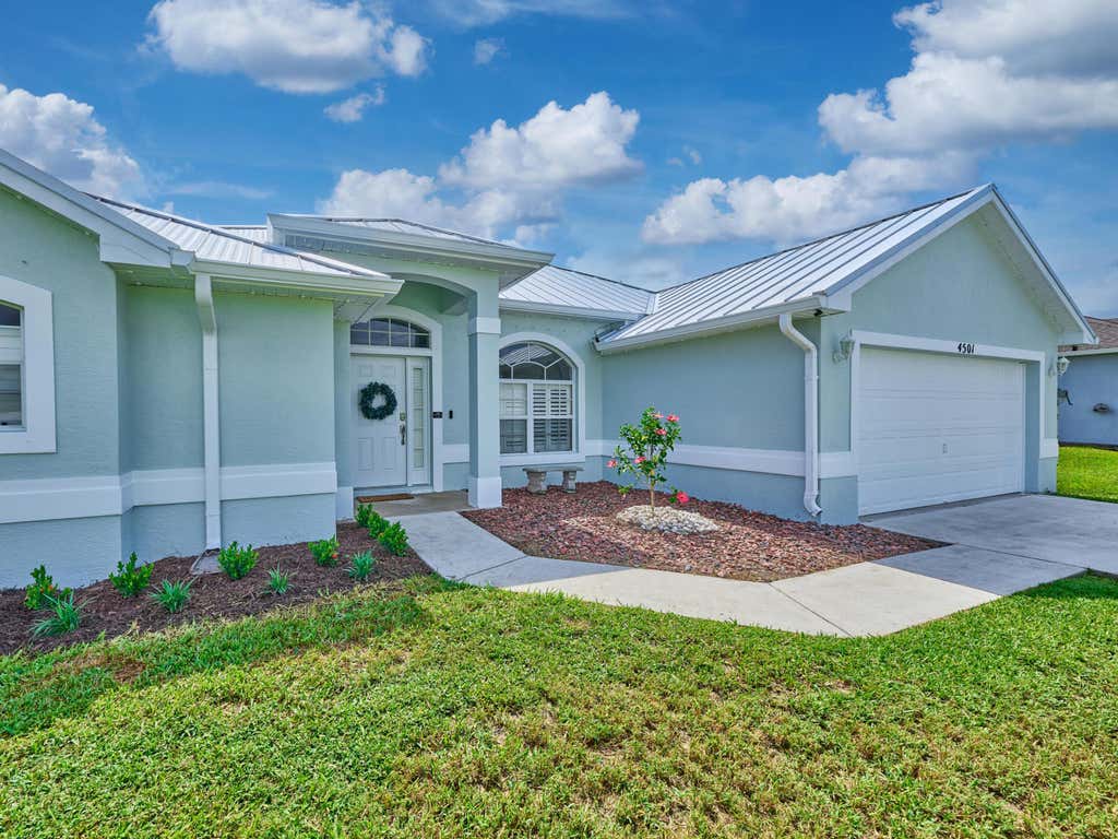 Photo of 4501 SW TABOR Street, Port Saint Lucie, FL 34953 (MLS # B26059555)