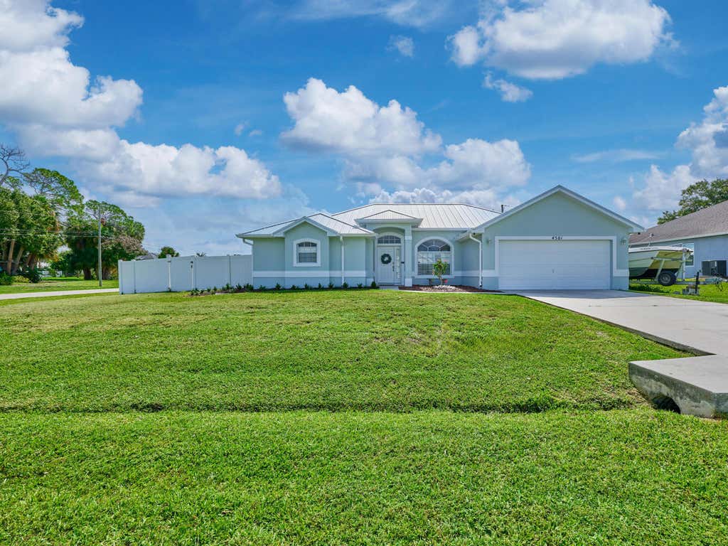 Photo of 4501 SW TABOR Street, Port Saint Lucie, FL 34953 (MLS # B26059555)