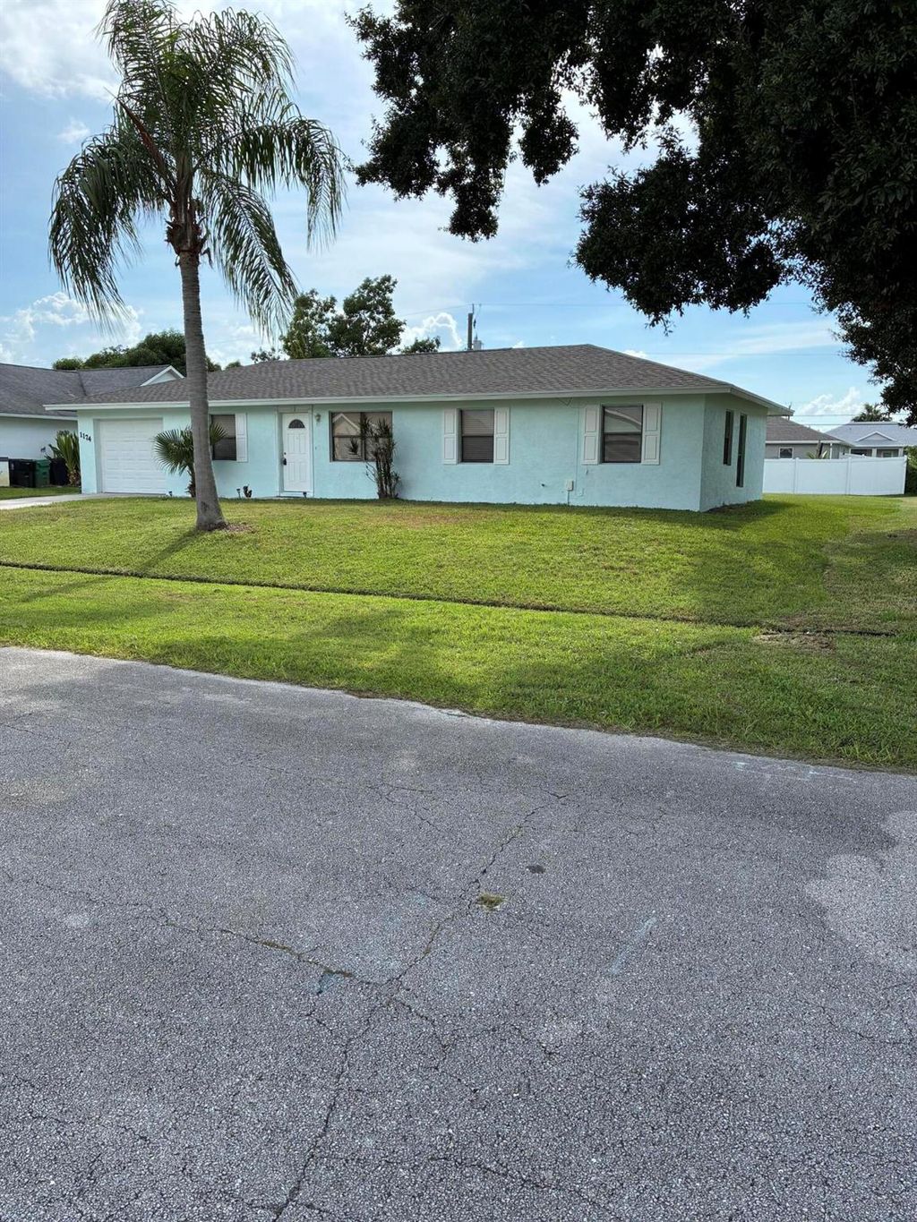 Photo of 1174 SW Hutchins Street, Port Saint Lucie, FL 34983 (MLS # R11124807)