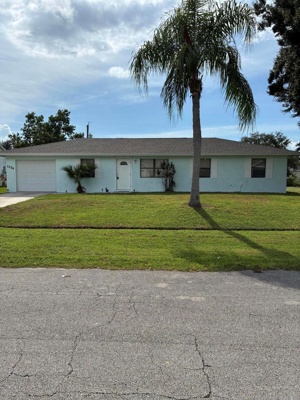 Photo of 1174 SW Hutchins Street, Port Saint Lucie, FL 34983 (MLS # R11124807)