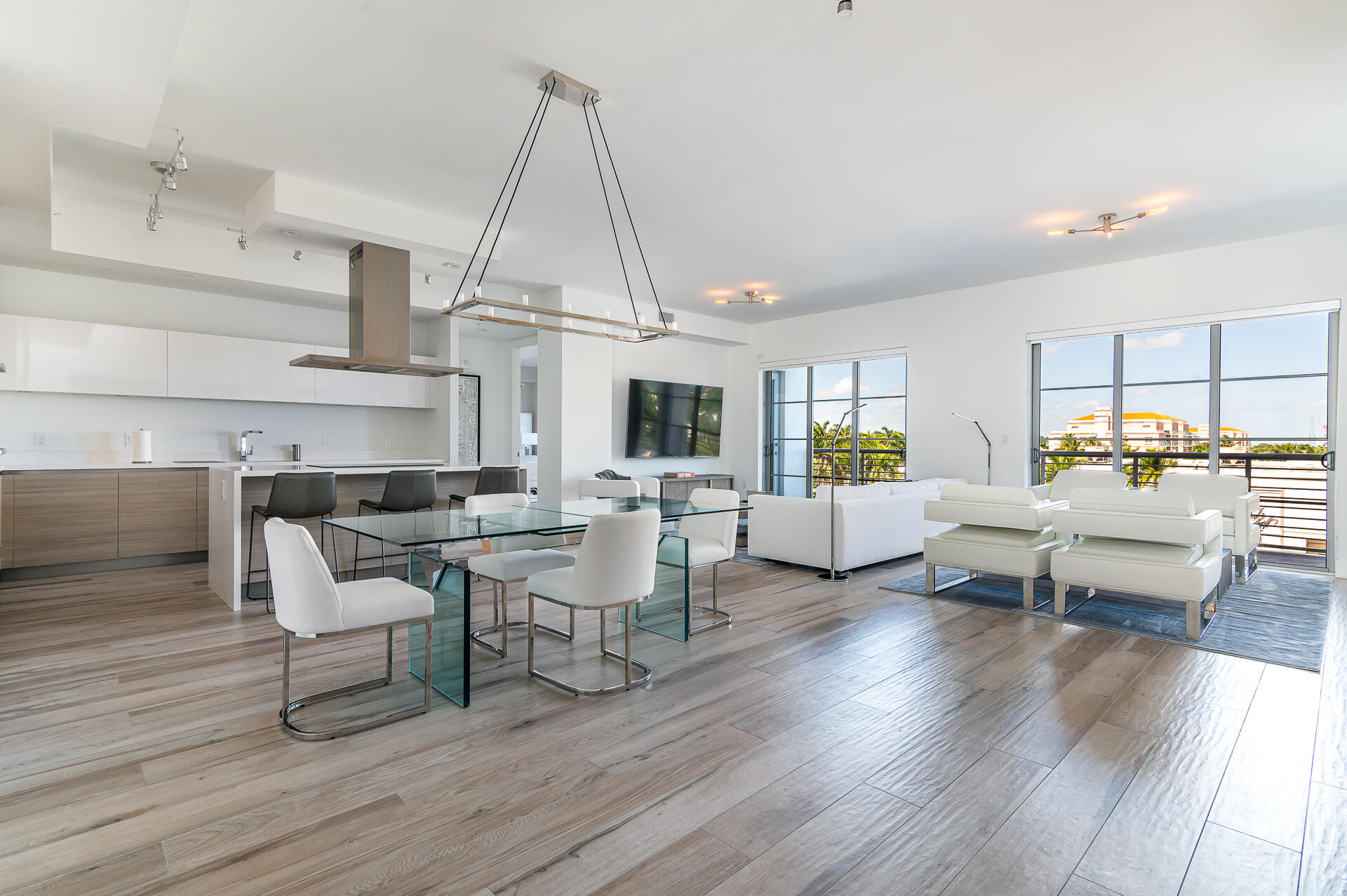 From the moment you step into this FULLY FURNISHED and TURNKEY stunning residence that has been professionally RH designed and upgraded through out, you will instantly feel at home. From the conversation spaces that are perfect for entertaining, to the hand selected designer finishes and fixtures, this unit has it all! A spacious open floor plan with beautiful upgrades, it's clear no detail has been overlooked. Large Master suite with double his and her custom built out closets and large Master Bath with soaking tub and large walk in shower. Beautiful open kitchen with Italian cabinetry and upgraded appliances. The Unit has shades through out, and custom light fixtures. A Large Balcony runs along the Great Room. Includes 2 Premier parking spaces and on-site storage unit.