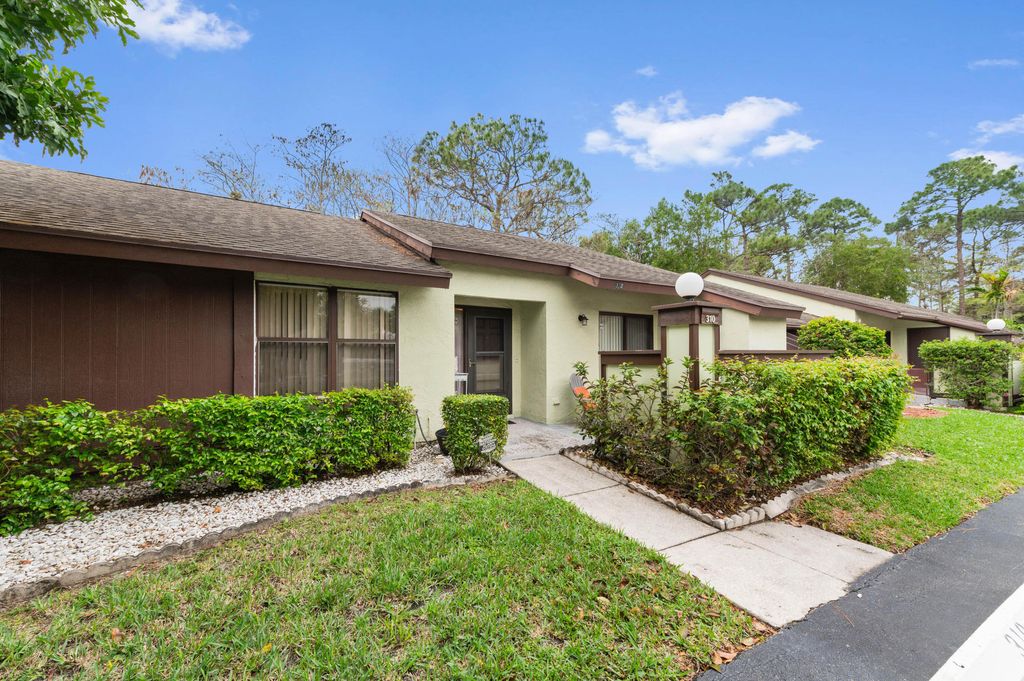 Photo of 310 Elmira Court, Royal Palm Beach, FL 33411 (MLS # B26007477)