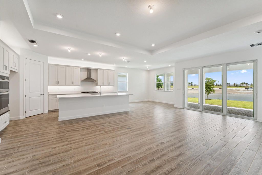 Photo of 12010 SW Toulon Street, Port Saint Lucie, FL 34987 (MLS # R10889031)