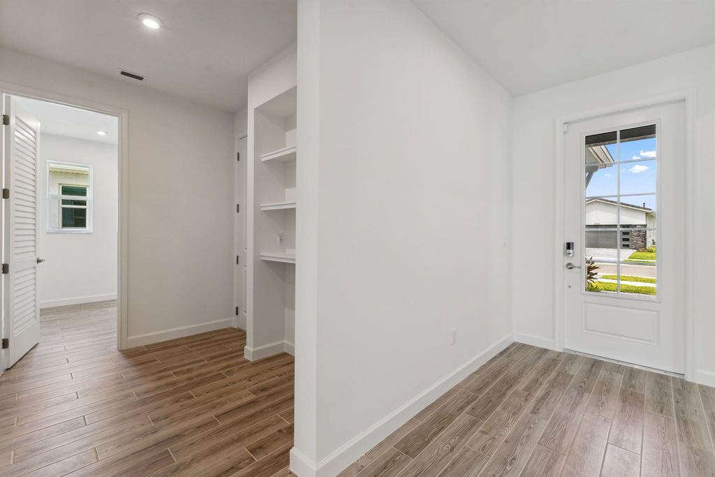 Photo of 12010 SW Toulon Street, Port Saint Lucie, FL 34987 (MLS # R10889031)