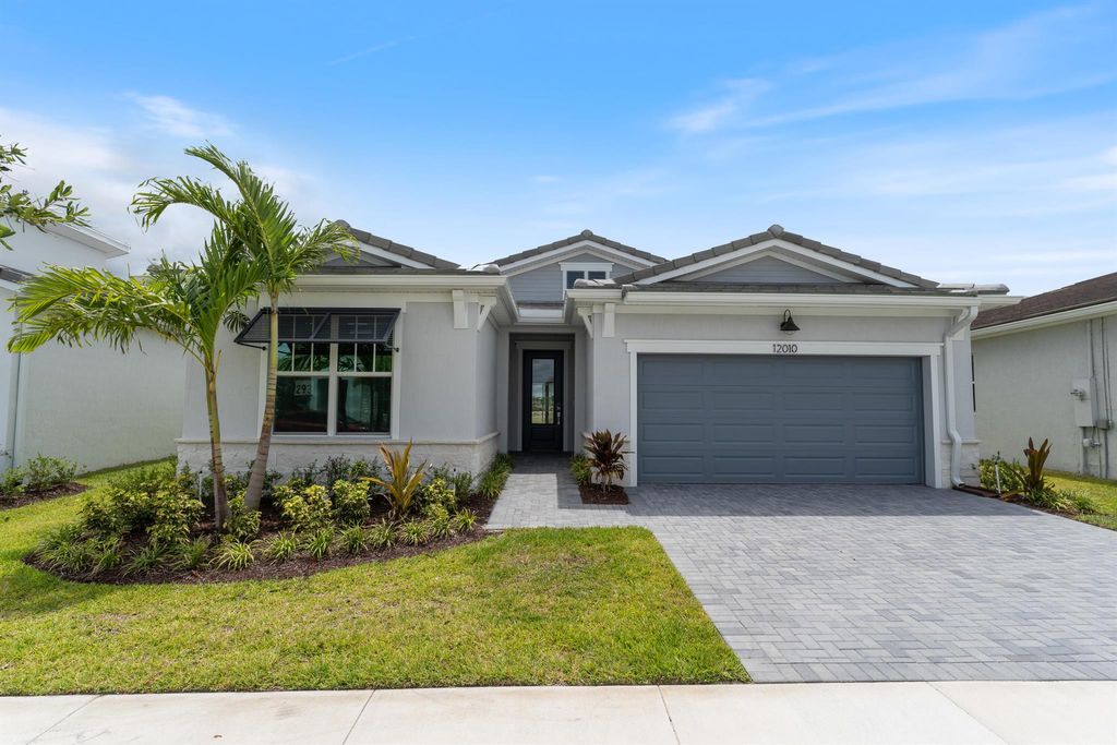 Photo of 12010 SW Toulon Street, Port Saint Lucie, FL 34987 (MLS # R10889031)