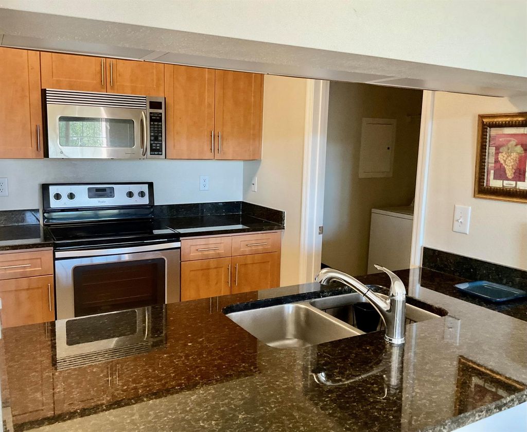 Photo of 6556 Emerald Dunes Drive #303, West Palm Beach, FL 33411 (MLS # R11135848)