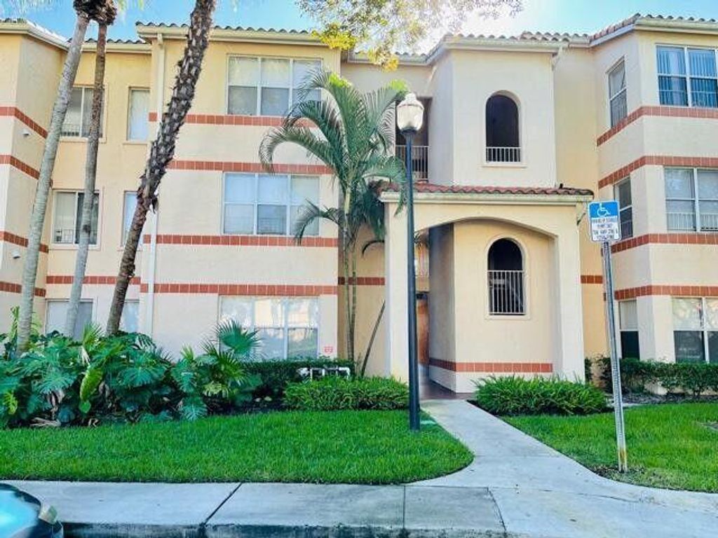 Photo of 3460 N Pinewalk Drive #317, Margate, FL 33063 (MLS # R11067409)