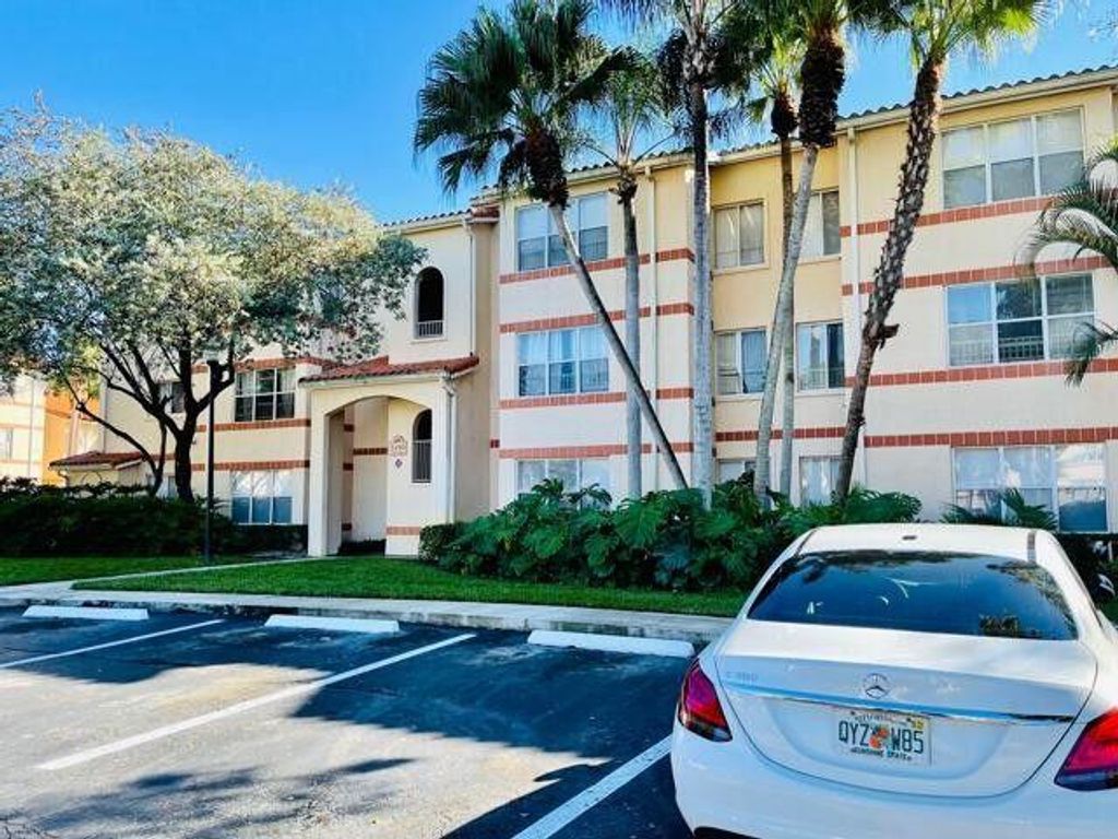 Photo of 3460 N Pinewalk Drive #317, Margate, FL 33063 (MLS # R11067409)