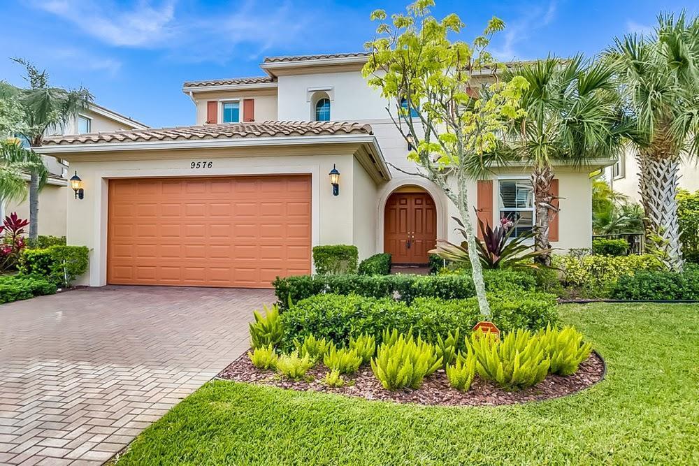 Nestled within the prestigious gated community of Olympia, this beautiful home offers unparalleled luxury and tranquility. This home features a large backyard that overlooks a peaceful lake setting that is perfect for relaxation of breathtaking views. Upgraded thru-out, the property features four spacious bedrooms upstairs, along with a convenient office/den on the main level. The kitchen is a culinary masterpiece, sure to impress even the most discerning chef, while abundant natural light bathes the interior, creating a warm and inviting atmosphere. Situated within the highly coveted ''A'' rated school district, this home ensures an exceptional educational experience for families. Its prime location offers proximity to the Wellington Green Mall & great local restaurants.