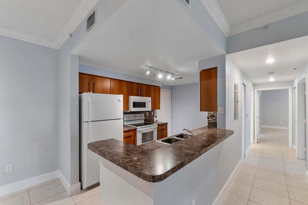 Photo of 5980 W Sample Road #104, Coral Springs, FL 33067 (MLS # B26043748)