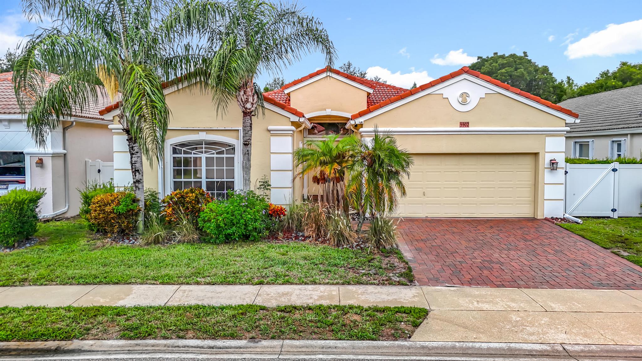Welcome to your slice of paradise in the sought-after gated community of Andros Isle! This beautifully maintained 4-bedroom, 2.5-bath single-story home showcases an inviting open floor plan with soaring ceilings, abundant natural light, and a private pool. The spacious kitchen features granite countertops and stainless steel appliances, ideal for both casual meals and entertaining. The primary suite offers two large walk-in closets and a spa-like bathroom with dual vanities, a soaking tub, and a separate shower. Enjoy Florida living at its finest--this home backs directly to an extensive nature trail perfect for hiking and off-road biking. Residents of Andros Isle enjoy resort-style amenities, including a clubhouse, fitness center, pool, tennis, and more--all just minutes from shopping, di