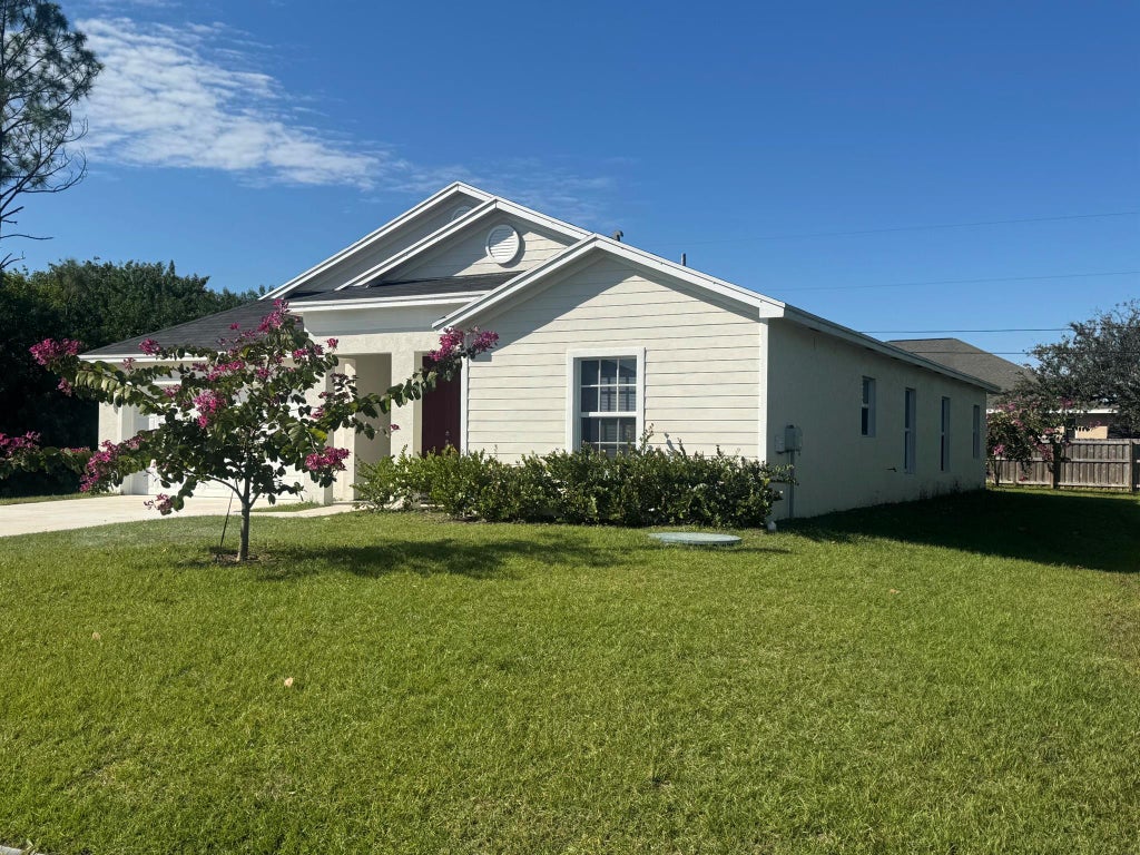 Photo of 1638 SW Paddock Street SW, Port Saint Lucie, FL 34987 (MLS # R11052727)