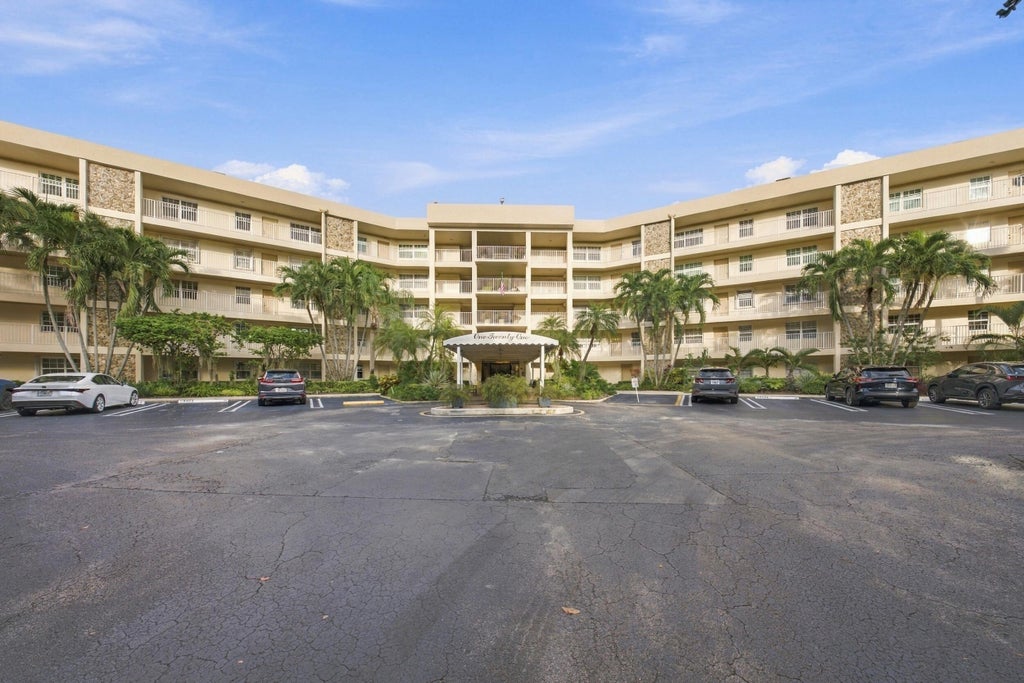 Photo of 800 Cypress Grove Drive #504, Pompano Beach, FL 33069 (MLS # B26080663)