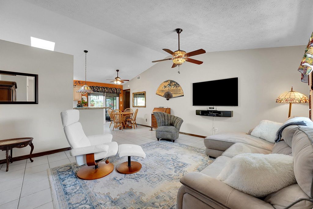 Photo of 2411 SE Floresta Drive, Port Saint Lucie, FL 34984 (MLS # R10982125)