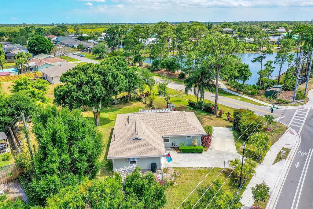 Photo of 2411 SE Floresta Drive, Port Saint Lucie, FL 34984 (MLS # R10982125)