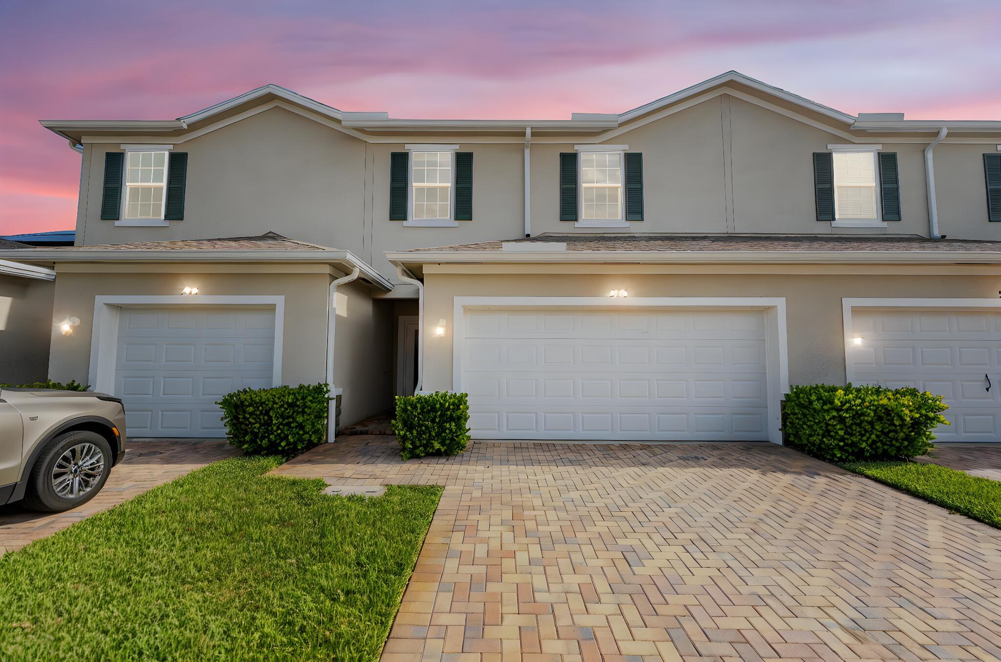 Welcome to River Place! This 3-bedroom, 2.5-bathroom townhouse, built in 2020, feels almost like new and offers the perfect blend of style, comfort, and convenience. Downstairs features durable tile flooring throughout the open-concept living areas and a spacious modern kitchen, while upstairs boasts all brand-new carpet for a fresh, cozy feel. A convenient first-floor powder room adds ease for guests and daily life, and all three bedrooms with two full bathrooms are located upstairs, keeping living and sleeping spaces smartly separated.Step outside to the screened-in porch--a private retreat perfect for morning coffee or evening relaxation. The attached 2-car garage provides ample storage and functionality, while low HOA fees add tremendous value. HOA dues cover exterior