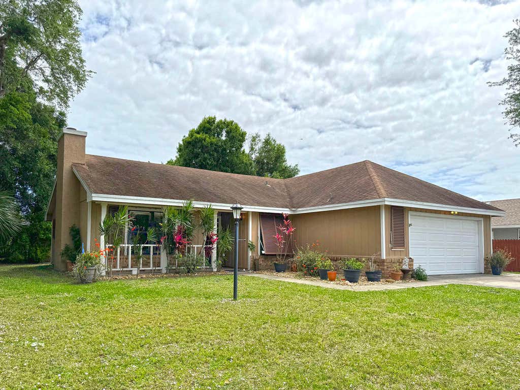 Photo of 5400 Paleo Pines Circle, Fort Pierce, FL 34951 (MLS # R10971935)