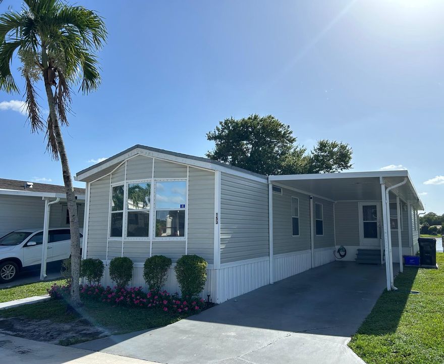 JUST LISTED!!! Lakefront 3BR/2BA with Florida room and tile floors. Features a shiplap accent wall, updated bathroom with walk-in shower, and interior washer/dryer hookups. New stove, Refrigerator, Ceiling Fans, and Water Heater. A/C 2018 (3-ton, 14 SEER)  Main roof reshingled in 2005; metal roof over carport and raised sunroom coated in 2012, Hurricane Plywood is  included.  ALL-AGE COMMUNITY WITH A-RATED SCHOOLS. STORAGE SHED'S ATTACHED.