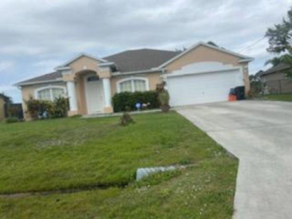 Photo of 6129 NW Deville Circle, Port Saint Lucie, FL 34986 (MLS # R10792530)