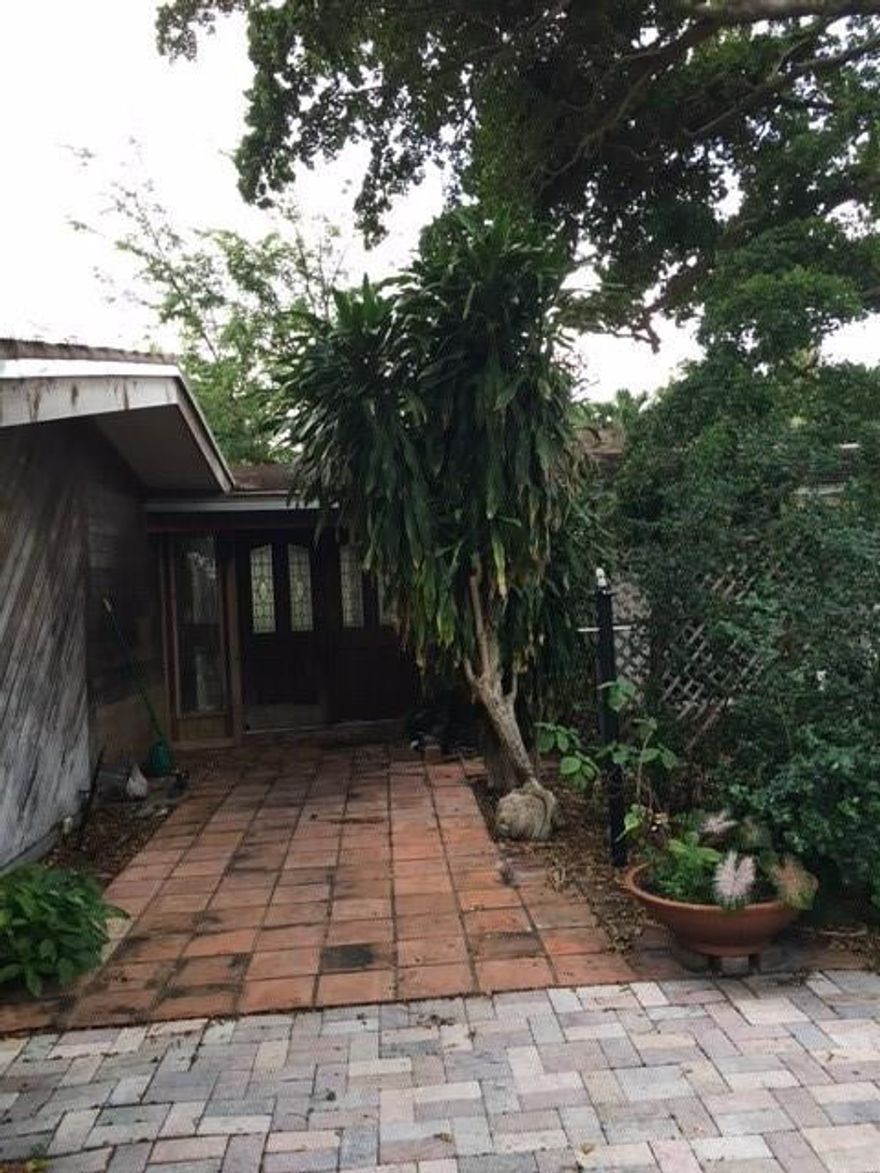 Home is located on a 100ft by 100 ft lot on a beautiful street in Coral Ridge....