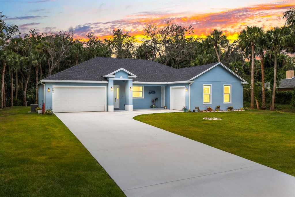 Photo of 2205 River Hammock Lane, Fort Pierce, FL 34981 (MLS # R10988893)