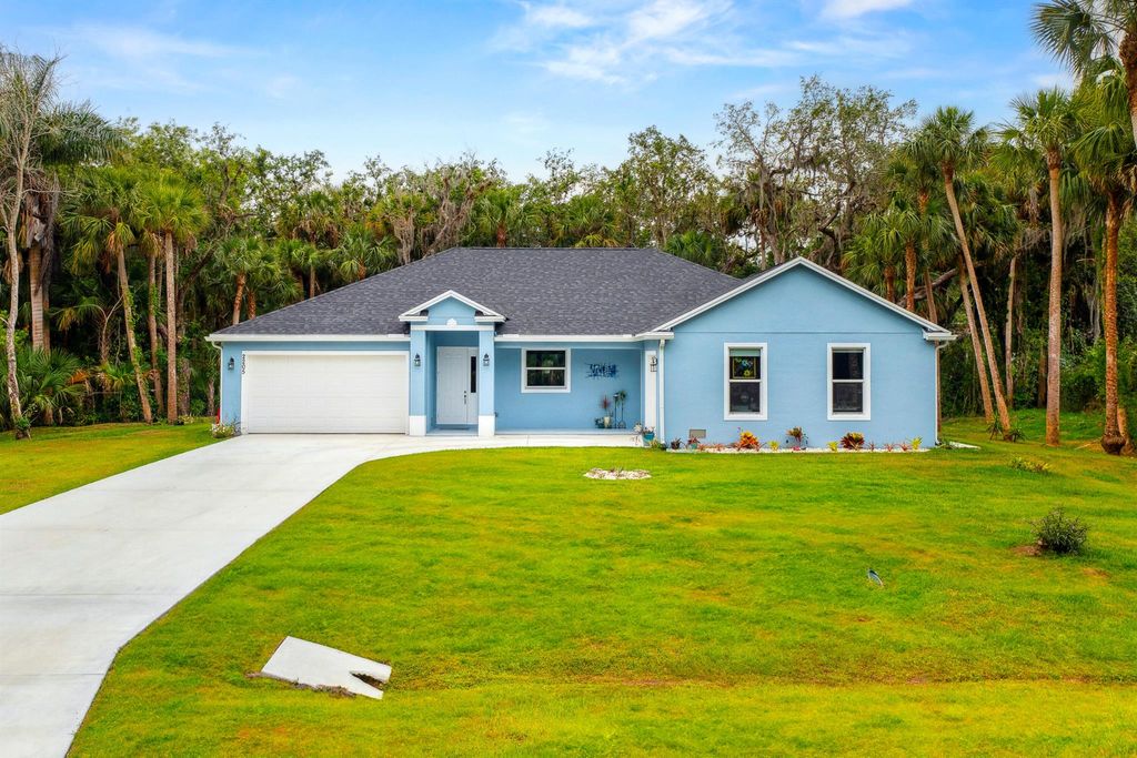 Photo of 2205 River Hammock Lane, Fort Pierce, FL 34981 (MLS # R10988893)