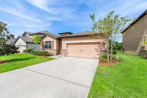 Photo of 6122 NW Regent Street, Port Saint Lucie, FL 34983 (MLS # R11132128)