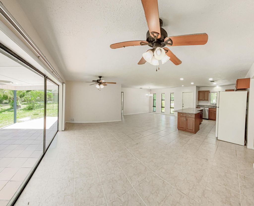 Photo of 441 SE Glenwood Drive, Port Saint Lucie, FL 34984 (MLS # B26013256)