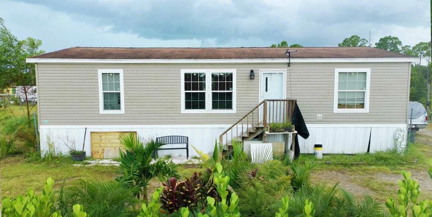 AMAZING OPPORTUNITY TO BUY THIS MANUFACTURE-HOME IN MONTURA RANCH. This home is situated in a private lot (1.25 Acres), with the BEST of living in a rural setting. This double wide manufactured home has spacious living area with 3 bedrooms and 2 bathrooms. Montura Ranch Estates is a rural community of South Central Florida in Hendry County residing between the cities of Clewiston and LaBelle. Centrally located within 1-1.5 hours from Miami, Naples, Fort Myers, Cape Coral, Fort Lauderdale, West Palm Beach, Port Charlotte and Okeechobee.