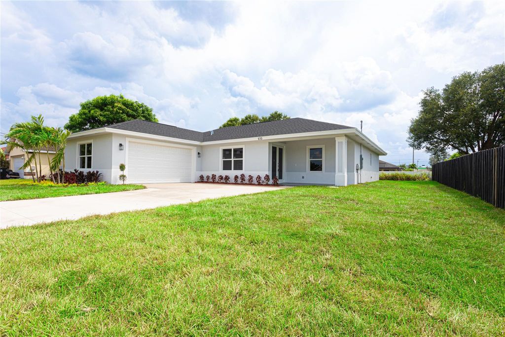 Photo of 270 SW Crescent Ave, Port St Lucie, FL 34984 (MLS # F10404009)