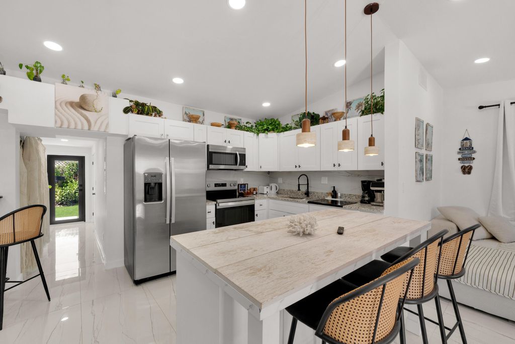 Photo of 1433 NE 53rd Court, Pompano Beach, FL 33064 (MLS # B26020715)