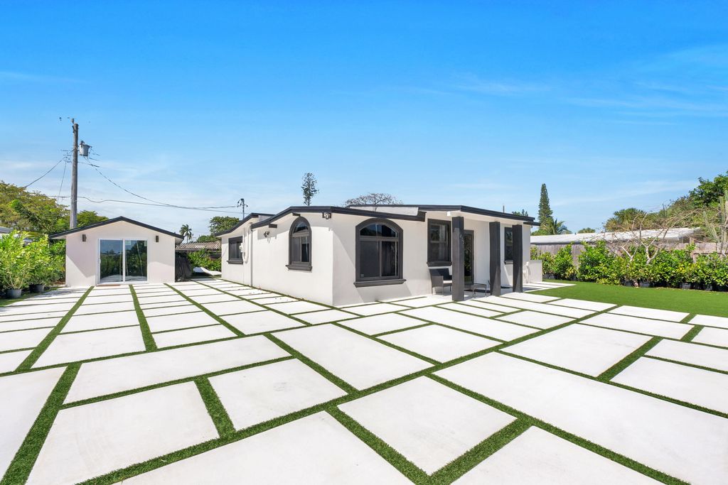 Photo of 1433 NE 53rd Court, Pompano Beach, FL 33064 (MLS # B26020715)