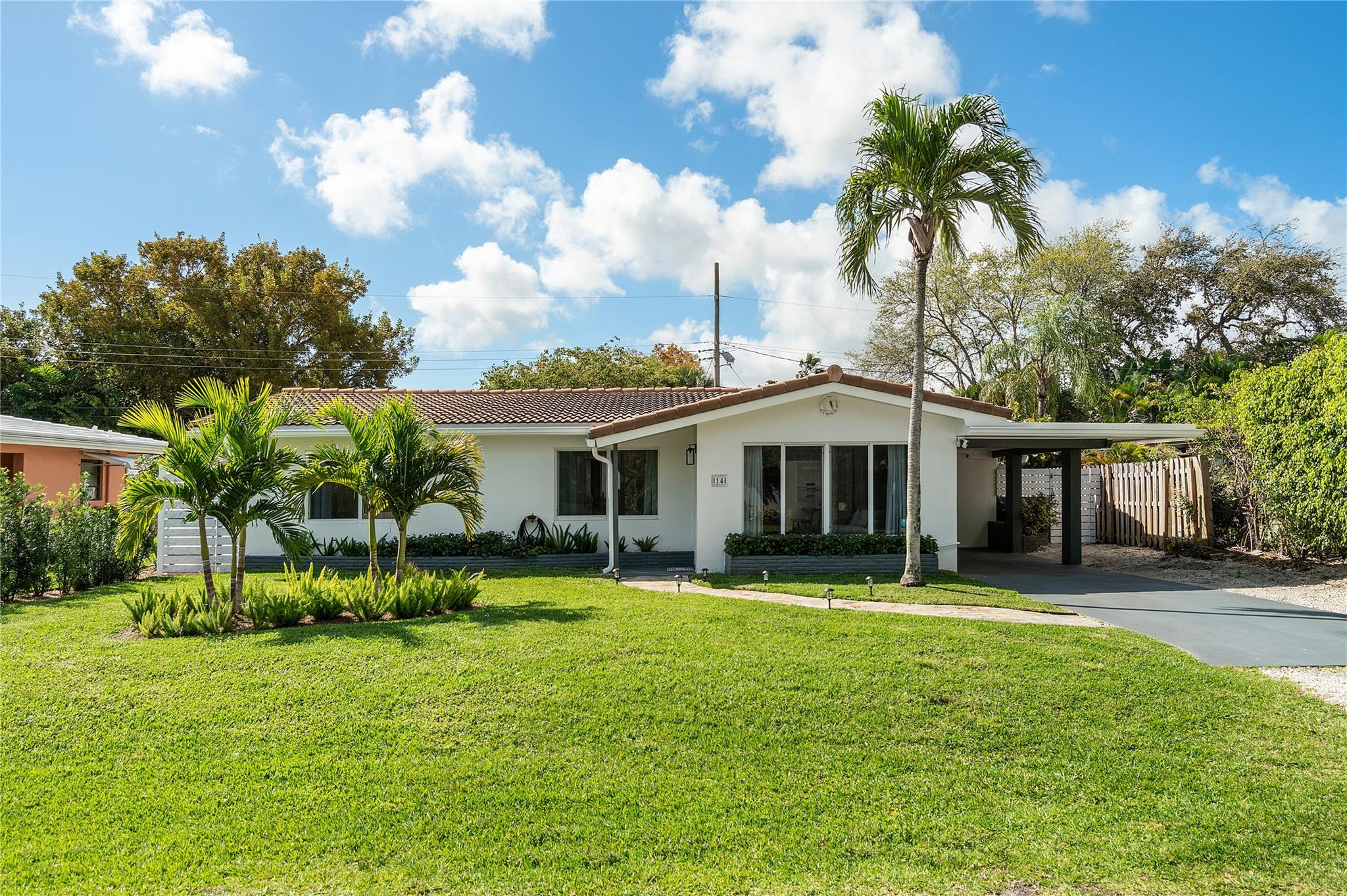 HIGH PERFORMING VACATION PARADISE! Fully renovated, Professionally decorated and equipped for an Airbnb. This stylish home is the perfect blend of comfort, luxury, and fun. Escape the sun under the shade in the massive gazebo with a smart TV. Lounge on your private beach sand or enjoy the night beneath the string lights. Grill up a feast at the Built-In Grill and dine at the outdoor dining table for 8. Beautiful quartz countertops, like new appliances, porcelain floors, & separate laundry room. New HVAC/ & Electrical 2021, Hurricane Impact Windows & Doors, NOT a flood zone, 25kw Generac generator w/1000 gallon propane tank, never lose power! All mins from the beach, Wilton Dr, Las Olas, and the Airport. Don't miss this RARE opportunity to own a profitable Turn Key Airbnb from day 1.