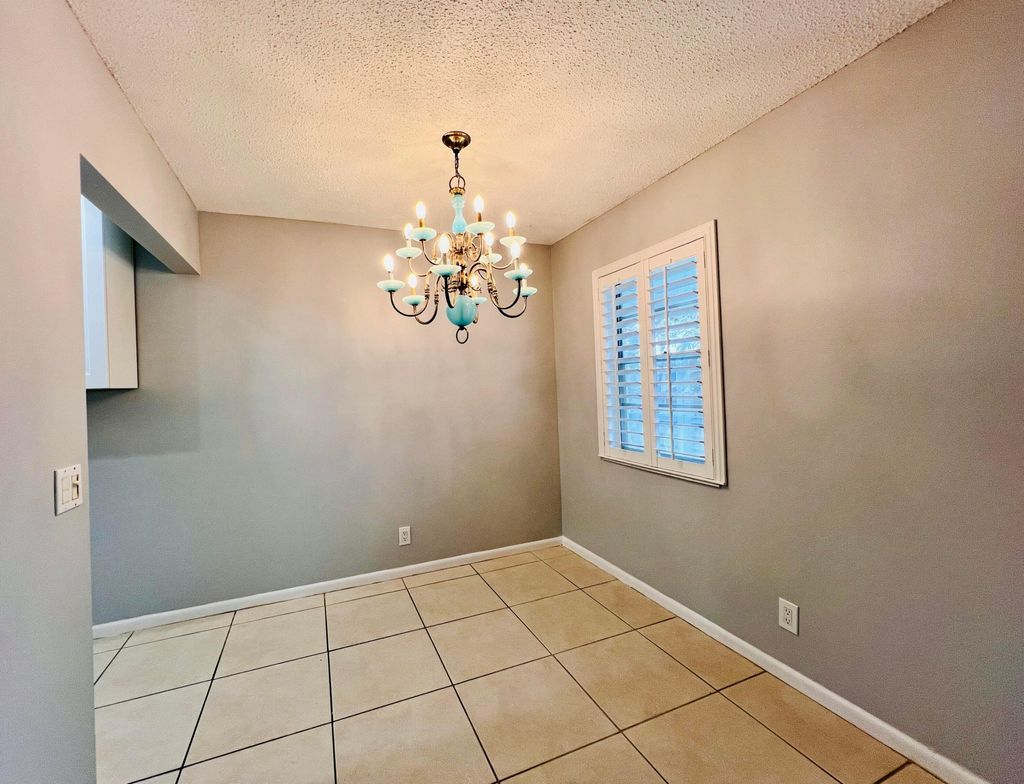 Photo of 74 Berkshire Cres, West Palm Beach, FL 33417 (MLS # B26027735)