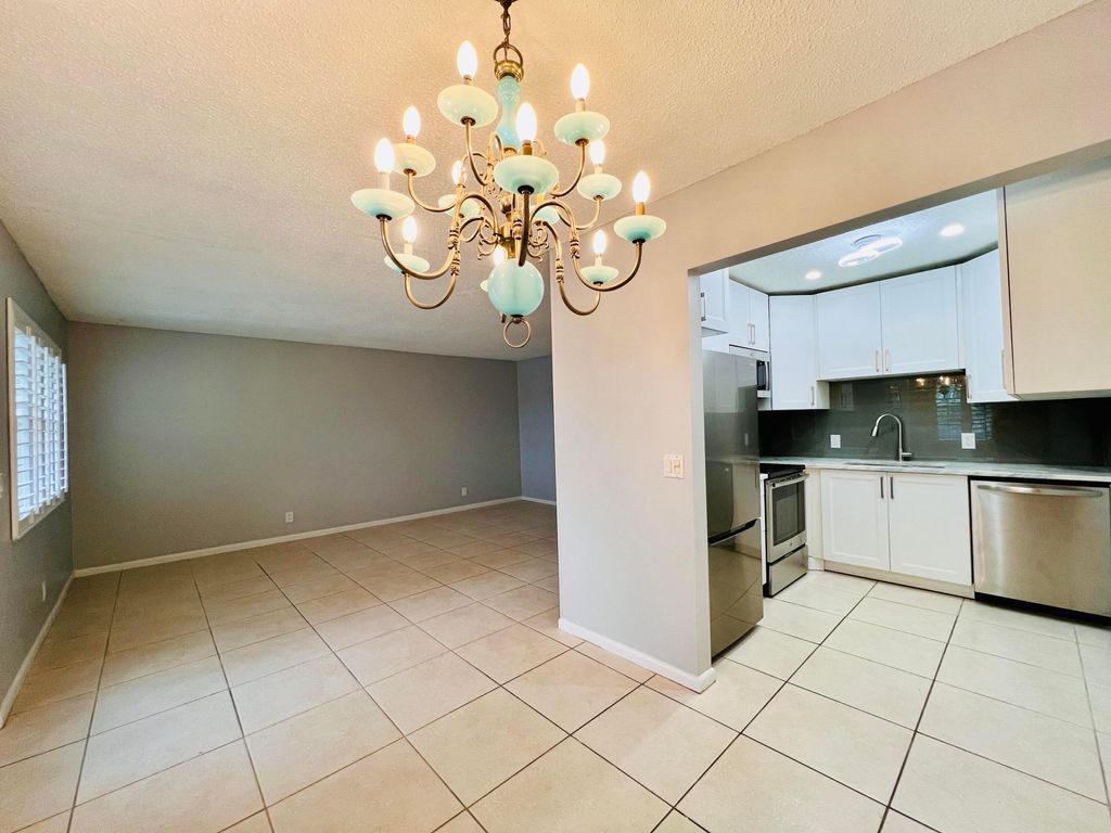 Photo of 74 Berkshire Cres, West Palm Beach, FL 33417 (MLS # B26027735)