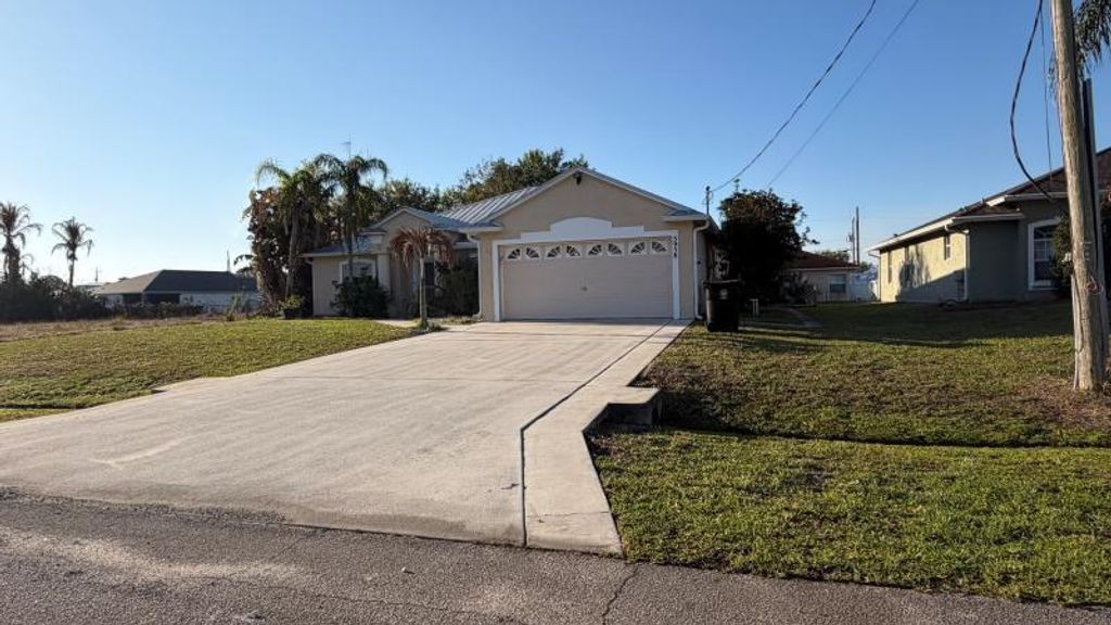 Photo of 5958 NW Baynard Drive, Port Saint Lucie, FL 34986 (MLS # F10548515)