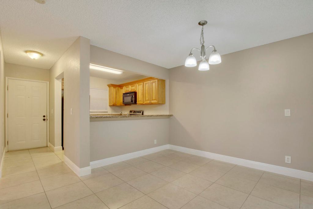 Photo of 1524 Lake Crystal Drive #H, West Palm Beach, FL 33411 (MLS # B26027675)