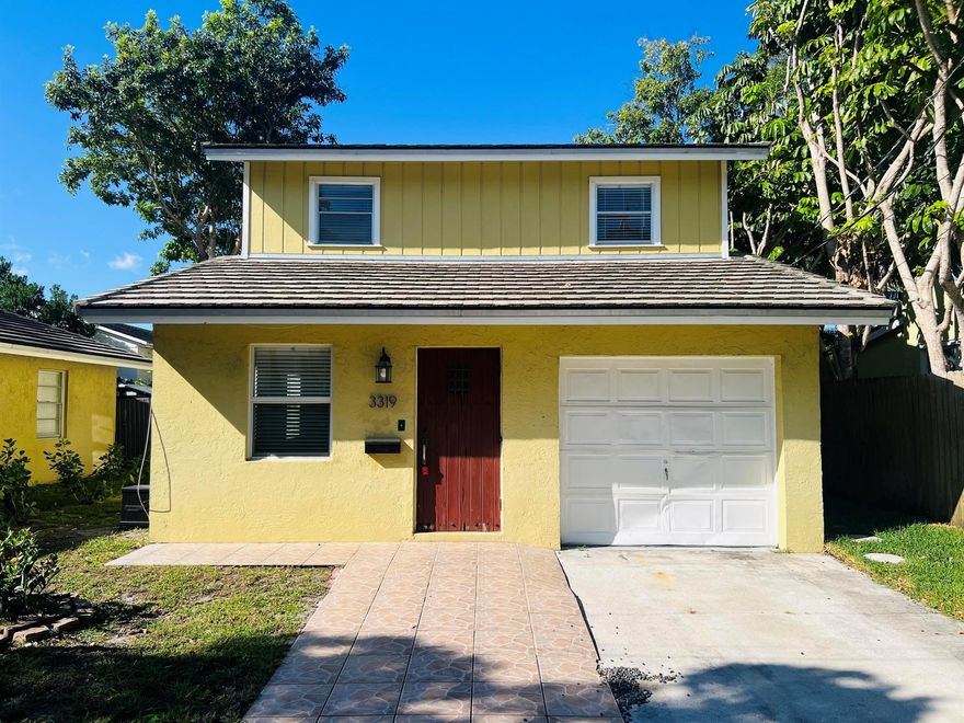 Charming and conveniently located, this cozy home is just minutes from downtown West Palm Beach, CityPlace, and the beach. The layout offers 2 bedrooms and 1 full bath, plus a versatile first-floor den/office or optional third bedroom created from a garage conversion. The remodeled kitchen features wood cabinetry, granite countertops, and a full appliance package. The bathroom has been completely updated, and the interior has been freshly painted and is move-in ready. Washer and dryer included. Ample front parking accommodates 3-4 vehicles. Ideally situated just two blocks from the Intracoastal Waterway and close to supermarkets, shopping, dining, Palm Beach International Airport, and major expressways.