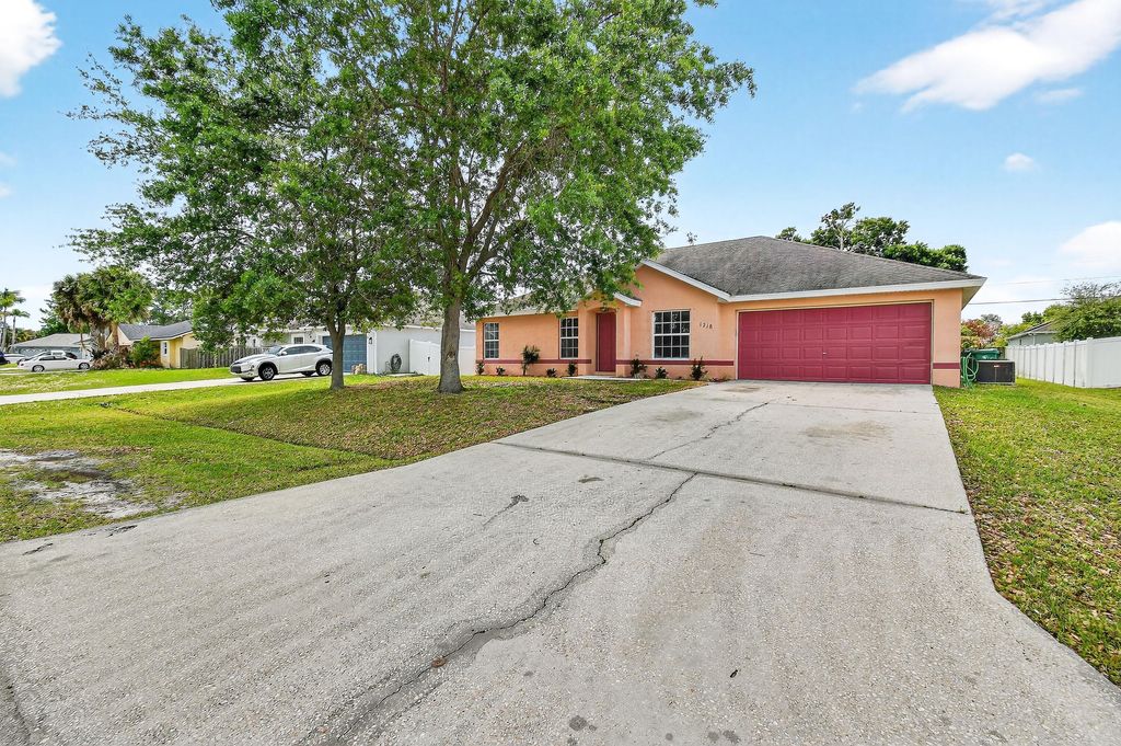 Photo of 1218 SW Century Avenue, Port Saint Lucie, FL 34953 (MLS # R11149061)