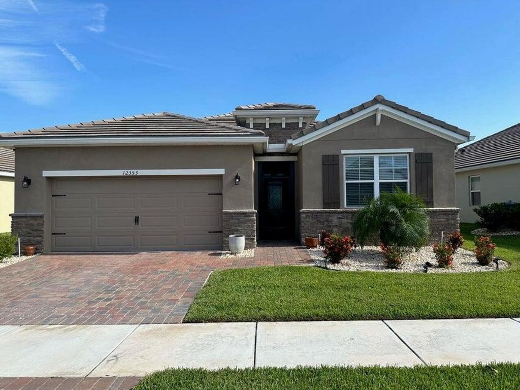 Photo of 12353 SW Arabella Drive, Port Saint Lucie, FL 34987 (MLS # R10940003)