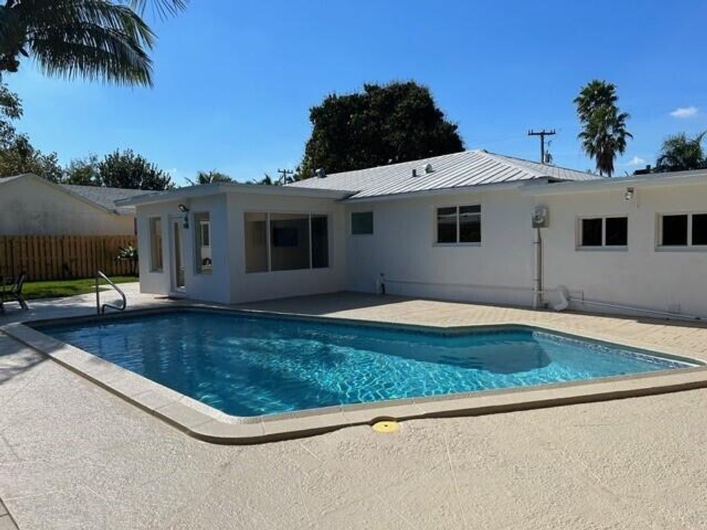 Photo of 127 W Riverside Drive, Tequesta, FL 33469 (MLS # R11044118)