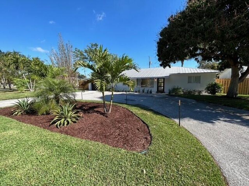 Photo of 127 W Riverside Drive, Tequesta, FL 33469 (MLS # R11044118)