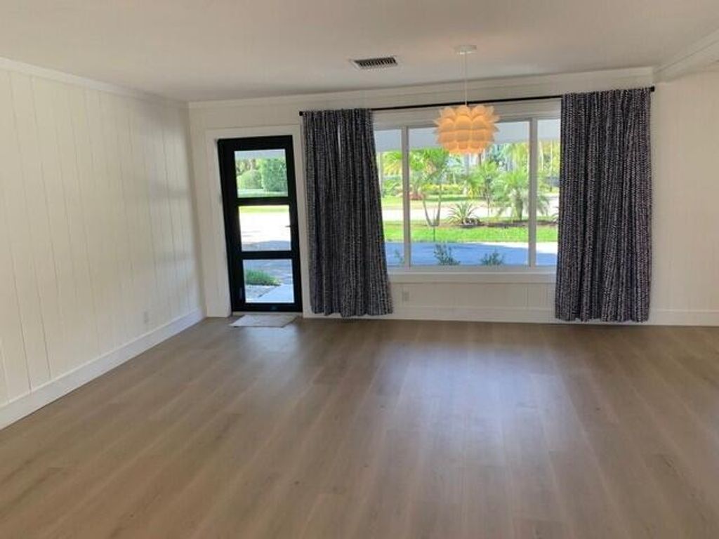 Photo of 127 W Riverside Drive, Tequesta, FL 33469 (MLS # R11044118)