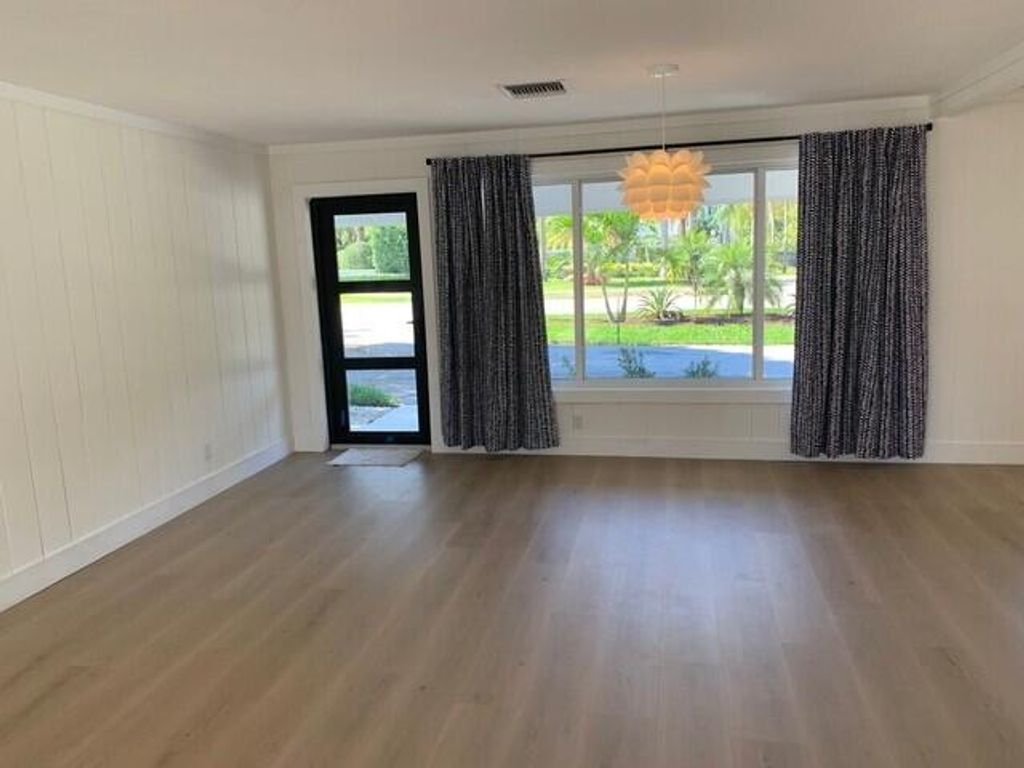 Photo of 127 W Riverside Drive, Tequesta, FL 33469 (MLS # R11044118)