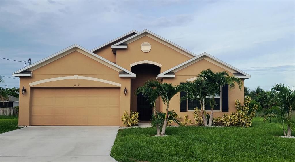 Photo of 3717 SW Kasin Street, Port Saint Lucie, FL 34953 (MLS # R10729784)