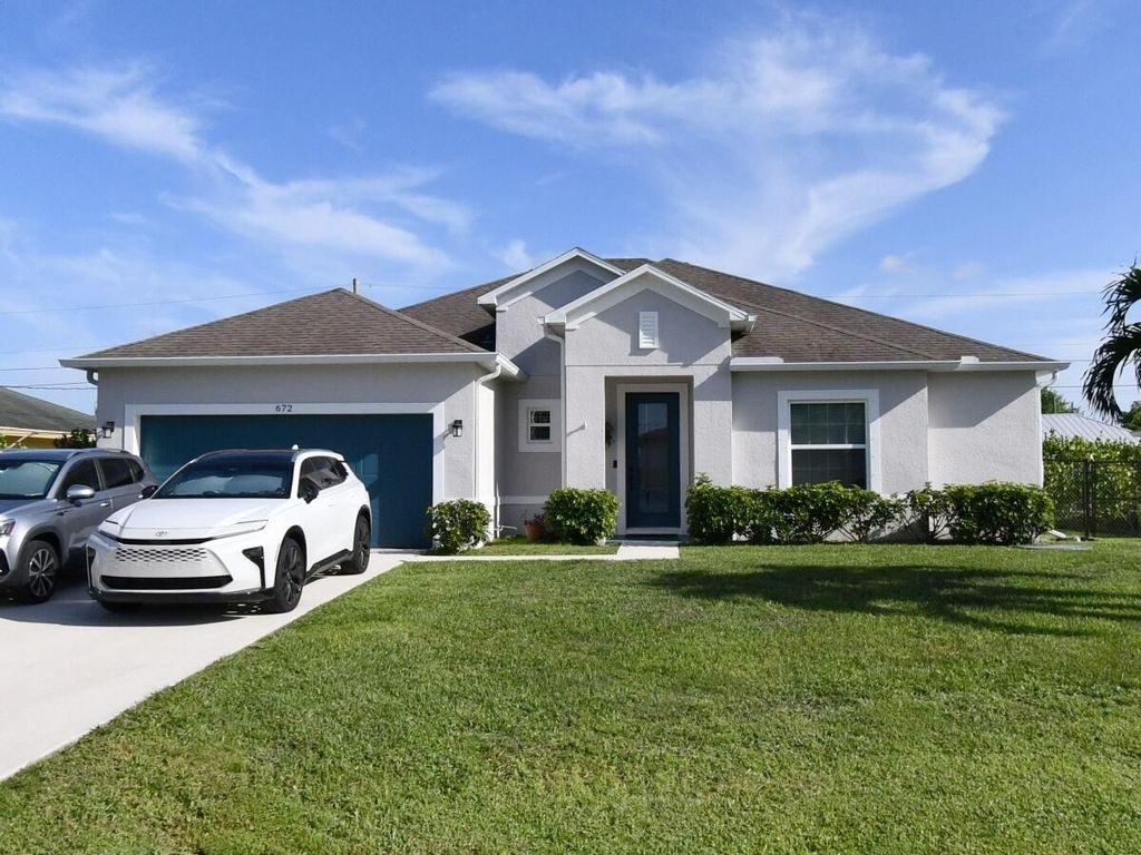 Photo of 672 SW Jacoby Avenue, Port Saint Lucie, FL 34953 (MLS # R11159943)