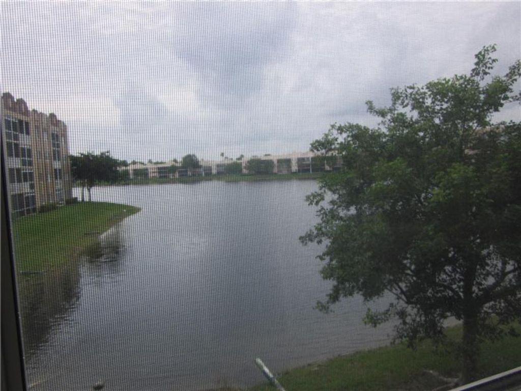 Photo of 7727 Southampton Ter #203, Tamarac, FL 33321 (MLS # F10305846)