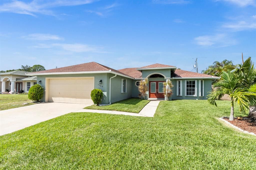 Photo of 1950 SW Beard Street, Port Saint Lucie, FL 34953 (MLS # R10750656)